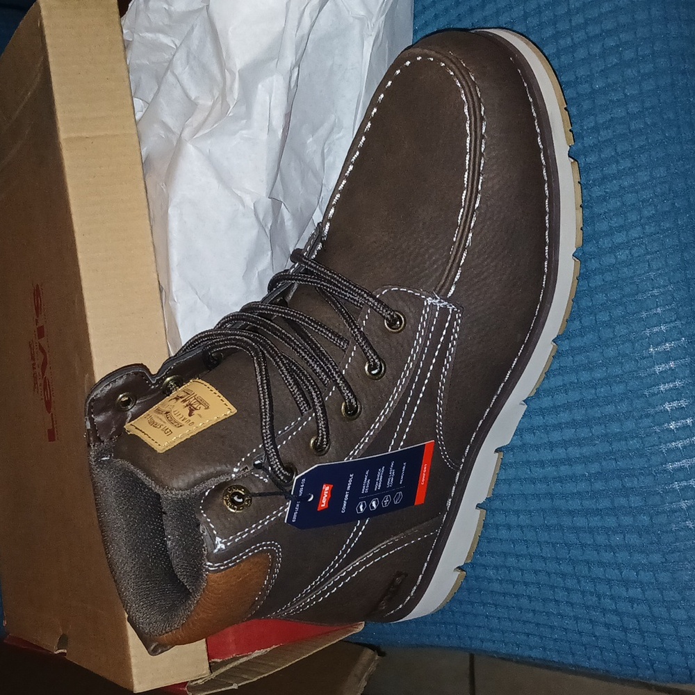 Genuine brown leather Levi boots.